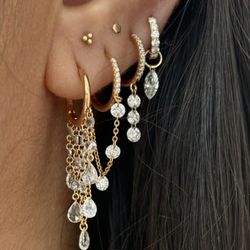 Curated Los Angeles - Your ear stack, your rules. Mix diamond hoops, drops and delicate gold details at Curated Los Angeles on Montana Avenue.