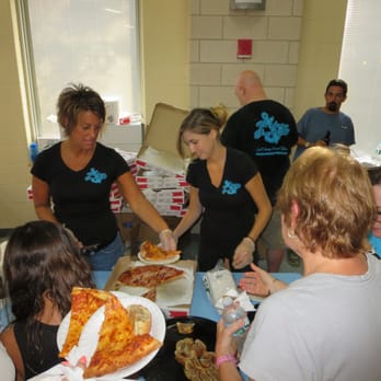 The Mooring Bar and Grill - Restaurant staff serving great tasting thin crust pizza at The Weymouth Food Pantry fundraiser on August 6th 2014. - Bars Near Me - Weymouth, Massachusetts
