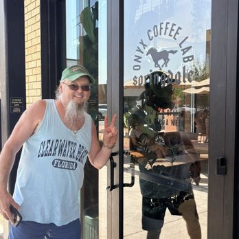 Onyx Coffee Lab - Brother Paige ready to open the door - Coffee & Tea Near Me - Springdale, Arkansas