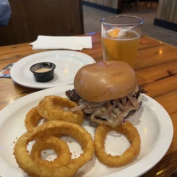 Miller's Ale House - That's the cue cheese burger with onion rings. - American Near Me - Levittown, New York Miller's Ale House - That's the cue cheese burger with onion rings. - American Near Me - Levittown, New York
