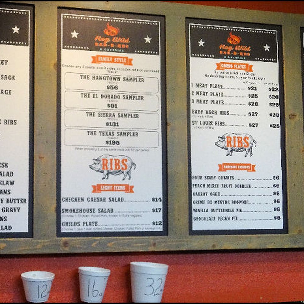 Hog Wild Bar-B-Que - The complete menu, including meat and sides, is posted above the ordering counter. - Barbeque Near Me - Placerville, California Hog Wild Bar-B-Que - The complete menu, including meat and sides, is posted above the ordering counter. - Barbeque Near Me - Placerville, California