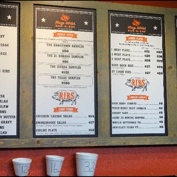 Hog Wild Bar-B-Que - The complete menu, including meat and sides, is posted above the ordering counter. - Barbeque Near Me - Placerville, California Hog Wild Bar-B-Que - The complete menu, including meat and sides, is posted above the ordering counter. - Barbeque Near Me - Placerville, California