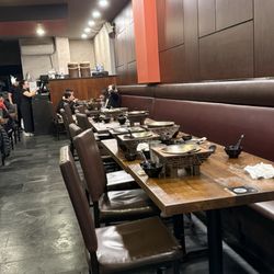 Tasty Pot - Minneapolis - Tables with finished dishes that aren't cleaned out