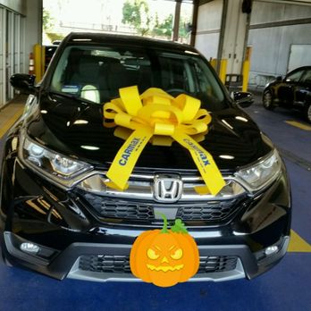 CarMax - This is how the car appeared to me, after having signed all of the paperwork etc! I really wanted to keep that bow though! - Car Buyers Near Me - Riverside, California