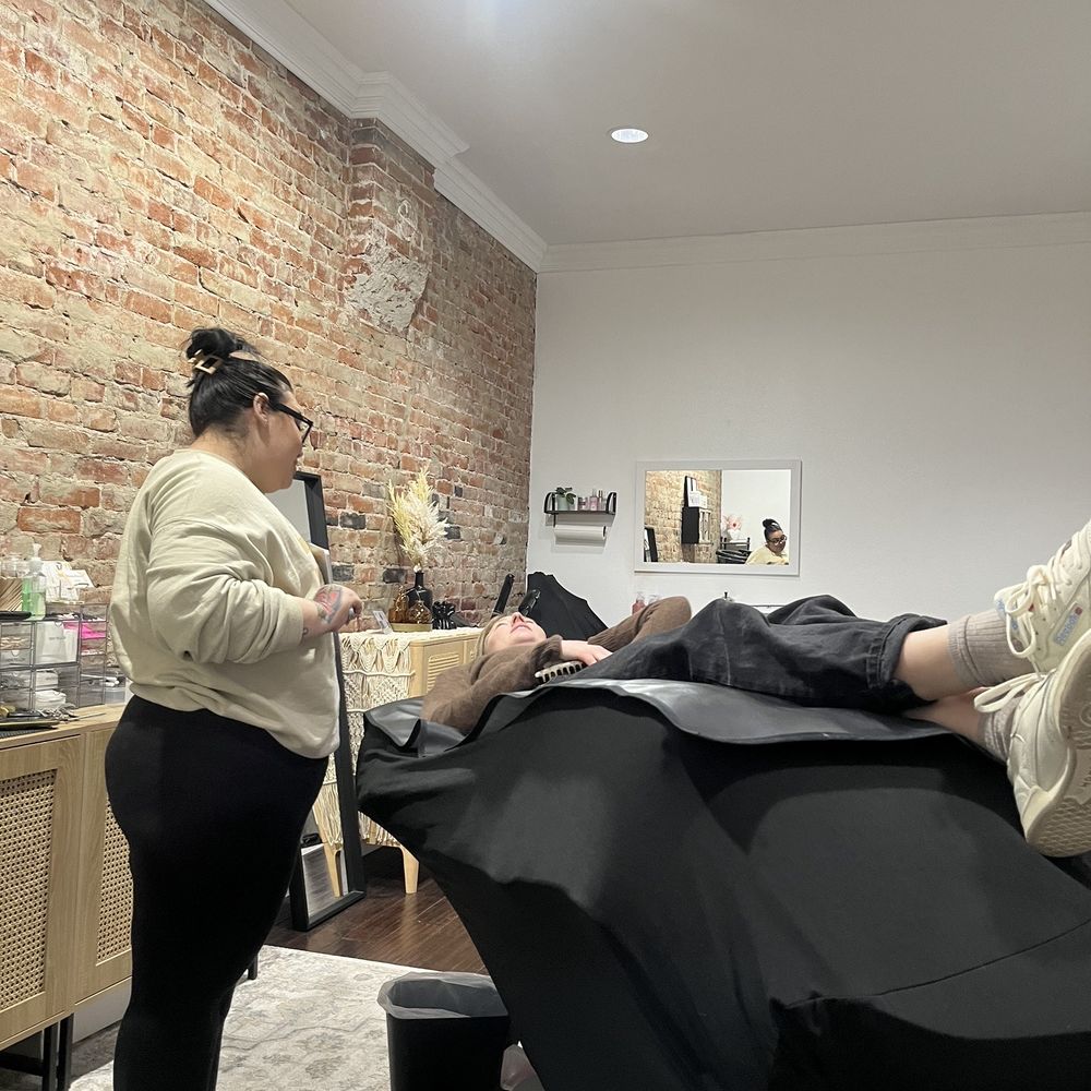 My friend getting her eyebrows waxed and dyed