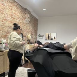 My friend getting her eyebrows waxed and dyed
