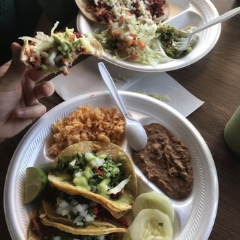 Ambro's Tacos Y Más - Tacos al Pastor, and Choriqueso. The choriqueso comes with chopped lettuce and tomatoes, guac, and sour cream. - Tacos Near Me - Denton, Texas