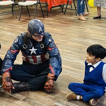Lone Star Character Entertainment - Captain America and Birthday Boy during a game activity - Party Characters Near Me Lone Star Character Entertainment - Captain America and Birthday Boy during a game activity - Party Characters Near Me