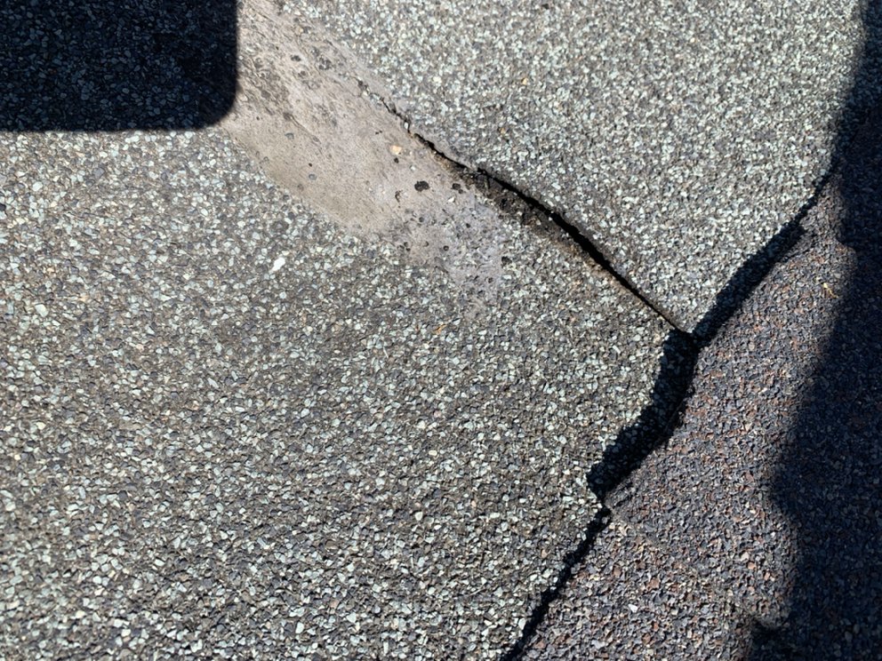 Slide of Century Roofing Company