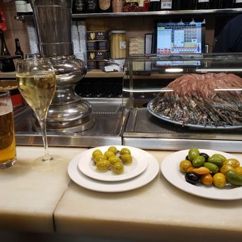 El Xampanyet - This place gets packed quickly. We came around 12:30 and ate standing up in the bar. - Tapas Bars Near Me - Barcelona, B