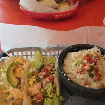 Voodoo Taco - Baja fish taco, fried chicken taco, cilantro rice, build your own burrito. - Tex-Mex Near Me - Omaha, Nebraska