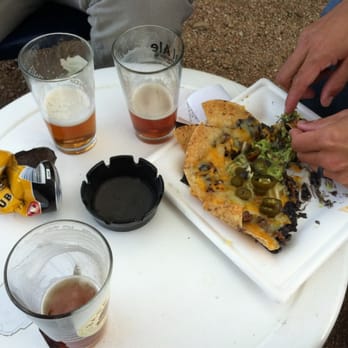 The Friendly Spot - Three beers and a plate of nachos. - Beer Gardens Near Me - San Antonio, Texas The Friendly Spot - Three beers and a plate of nachos. - Beer Gardens Near Me - San Antonio, Texas