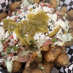 These are the tachos (tater tot nachos with pulled pork!) Double yum!!
