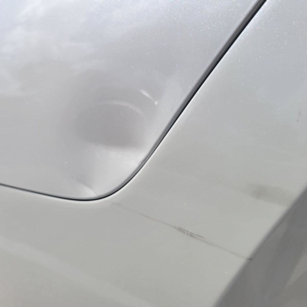 Rear quarter panel and bumper damage. Rear quarter panel and bumper damage.