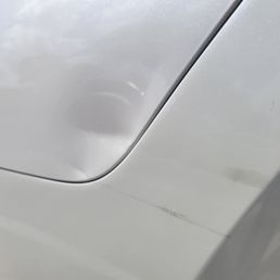 Rear quarter panel and bumper damage.