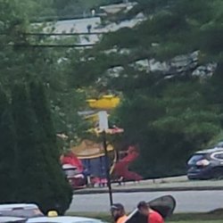 K's Taxi - Photo is of the taxi parked in the parking lot across from parking lot pick up location, never called me to cancel, just ignored all my call