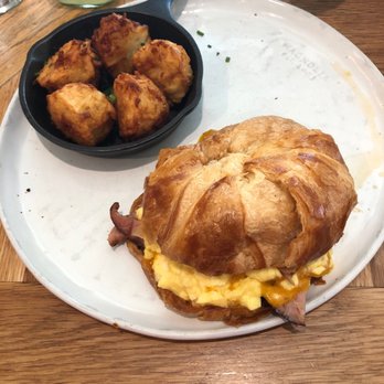 Magnolia Table - Chip's Ham Sandwich with tater tots. - Breakfast & Brunch Near Me - Waco, Texas Magnolia Table - Chip's Ham Sandwich with tater tots. - Breakfast & Brunch Near Me - Waco, Texas