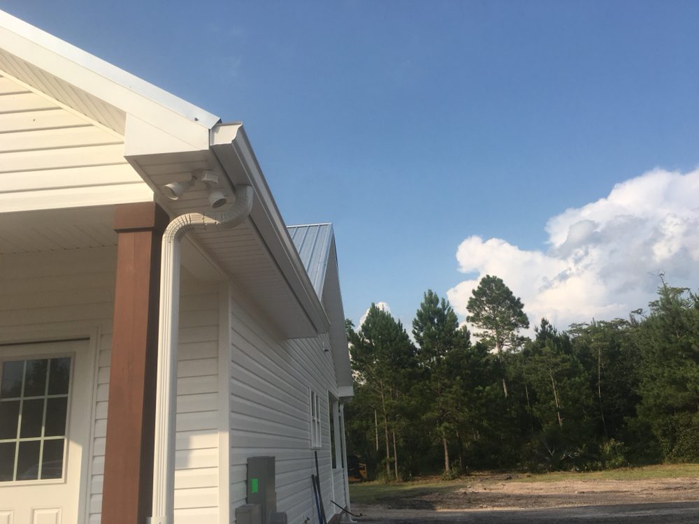 Slide of Saxon Roofing and Gutters