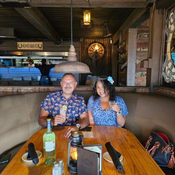 Orange County Mining Company - Enjoying dinner at a booth. - Steakhouses Near Me - Orange, California