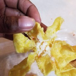 Main Moon - Crab rangoon opened to show the tiny amount of filling used.