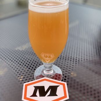 Matchless Brewing - a glass of beer on a table - Breweries Near Me - Olympia, Washington