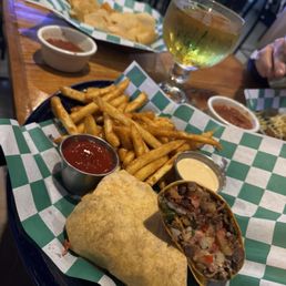 California hot wrap Steak asada / french fries / pico de gallo / bacon wrapped jalapeno / queso blanco. California hot wrap Steak asada / french fries / pico de gallo / bacon wrapped jalapeno / queso blanco.