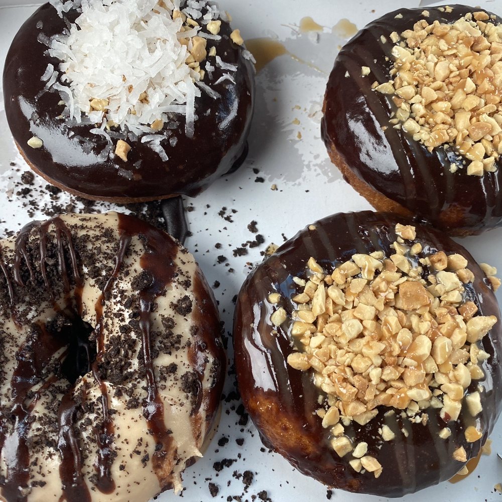 Duck Donuts - Donuts - coconut chocolate, peanut butter cheesecake, chocolate caramel crunch - Donuts Near Me - Paramus, New Jersey Duck Donuts - Donuts - coconut chocolate, peanut butter cheesecake, chocolate caramel crunch - Donuts Near Me - Paramus, New Jersey