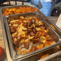 Prezo - The leftover food Prezo didn't want our grieving family to leave the premises with.