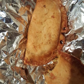 Empanada Mama - Hell's Kitchen - Size of empenada ( 1 is half eaten)  sooo good - Latin American Near Me - New York, New York