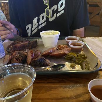 Hard Eight BBQ - Hobby's plate included ribs, sausage and brisket, Texas style, potato salad and jalapeños. - Barbeque Near Me - Coppell, Texas