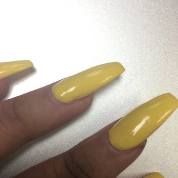 Village Nails and Spa - This is an example of the uneven coats of polish. You can see on these two fingers where the last coat of yellow stops. - Nail Salons Near Me - Nashville, Tennessee Village Nails and Spa - This is an example of the uneven coats of polish. You can see on these two fingers where the last coat of yellow stops. - Nail Salons Near Me - Nashville, Tennessee