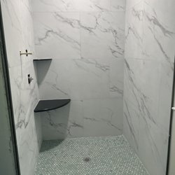 Unfinished primary bathroom, waiting on shower door