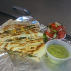 Twisted Tacos - Meat Quesadilla. Your choice meat either Carne Asad or Al Pastor, and choice of Garnishes and Salsas.