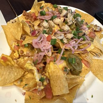 Hard Rock Cafe - Classic Nachos with chicken - American Near Me - Tampa, Florida Hard Rock Cafe - Classic Nachos with chicken - American Near Me - Tampa, Florida