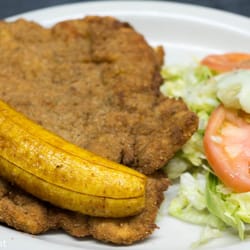 Castillo Restaurant - Pollo Apanada - Breaded Chicken with Salad and Sweet Plantains