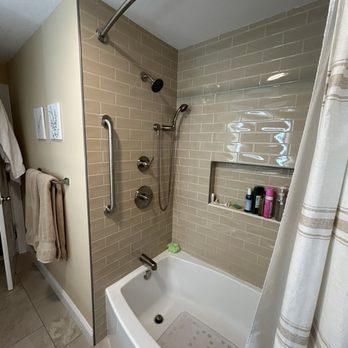 buildPROS - New rounded tub, tiles, safety bars and shower package installed with niche. - General Contractors Near Me - Warwick, Rhode Island