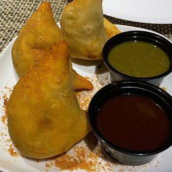 Himalayan Cafe - a plate of empanadas with dipping sauces - Indian Near Me - Renton, Washington Himalayan Cafe - a plate of empanadas with dipping sauces - Indian Near Me - Renton, Washington