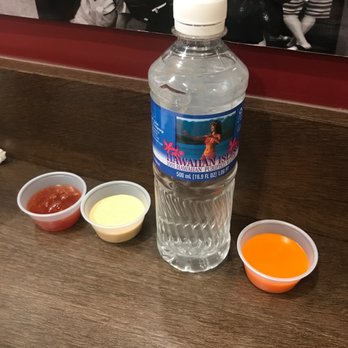 Mr Cow - Bottle water and sauces - Hot Dogs Near Me - Aiea, Hawaii Mr Cow - Bottle water and sauces - Hot Dogs Near Me - Aiea, Hawaii