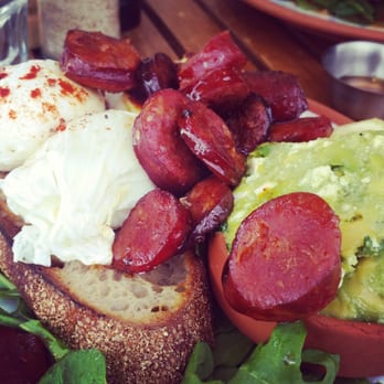 Room for a Pony - Poached eggs with chorizo, haloumi, and avocado and feta smash. Delicious! - Cafes Near Me - North Hobart, TAS