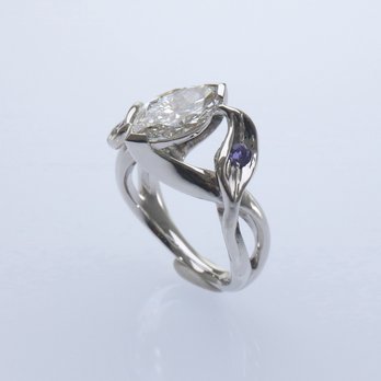 Jewelry by Design - Engagement ring, with a unique setting for the marquise that protects the diamond's fragile tips and allows gloves to slide over at work - Jewelry Near Me - San Diego, California