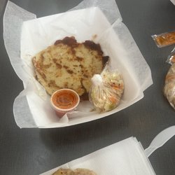 El Sombrero Taqueria - Bean and cheese Papusas with fermented cabbage salad and salsa roja.