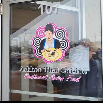 Arkhan Thai Cuisine - a woman holding a sign - Asian Fusion Near Me - Green Bay, Wisconsin Arkhan Thai Cuisine - a woman holding a sign - Asian Fusion Near Me - Green Bay, Wisconsin