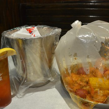 Crab Du Jour - Charlotte - Dinner in a bag, trash bucket and Iced Tea - Seafood Near Me - Charlotte, North Carolina Crab Du Jour - Charlotte - Dinner in a bag, trash bucket and Iced Tea - Seafood Near Me - Charlotte, North Carolina