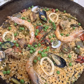 Walla Cozumel - The Paella. It's a very thin layer so don't get freaked out by the size. It's a personal size for sure. - Mediterranean Near Me - San Miguel de Cozumel, ROO