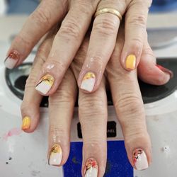 Princess Nails and Spa - Fall design, leaves falling and turning into birds.  Done by Ni.
