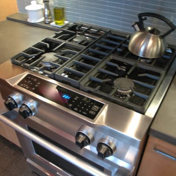 Teleo Builders - a stove with a tea kettle on top - General Contractors Near Me Teleo Builders - a stove with a tea kettle on top - General Contractors Near Me