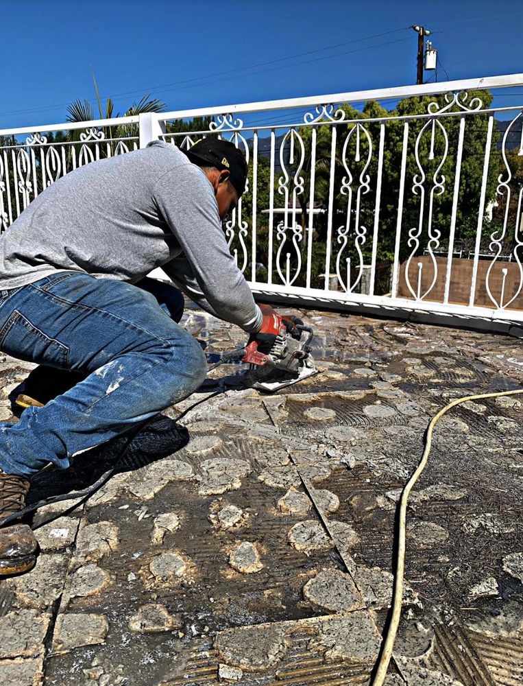 Slide of Goliath Roofing