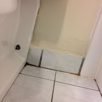 Silver Beach Hotel - Dirty bathroom tile - Hotels Near Me - St. Joseph, Michigan Silver Beach Hotel - Dirty bathroom tile - Hotels Near Me - St. Joseph, Michigan