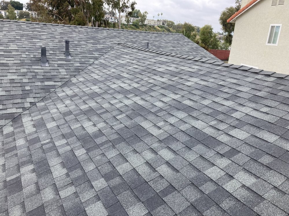 Slide of Mo's Professional Roofing