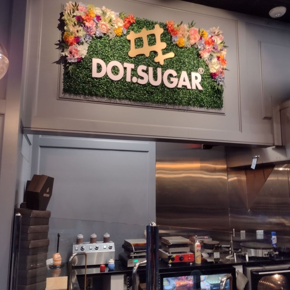 Dot Sugar - Fresh donut sauce toppings being made below and a bit of dot sugar flair on top - Desserts Near Me - Beaverton, Oregon Dot Sugar - Fresh donut sauce toppings being made below and a bit of dot sugar flair on top - Desserts Near Me - Beaverton, Oregon